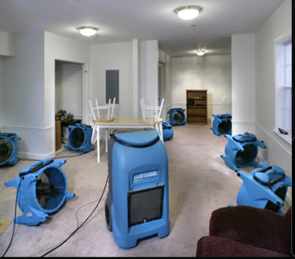 Air movers and dehumidifier setup for Water Damage Restoration in Tuskegee